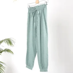 Plus Size|Spodnie Materiałowe^Royalfashion Zielone damskie spodnie materiałowe w groszki PLUS SIZE zielony